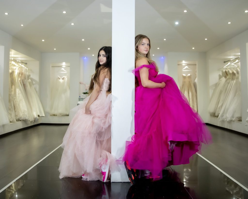 2 GIRLS IN PINK PROM DRESSES