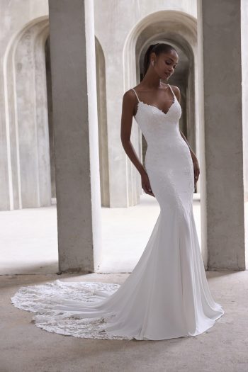Morilee Amaris 2986 sheath wedding dress, with a low scoop back and lace cutaway train