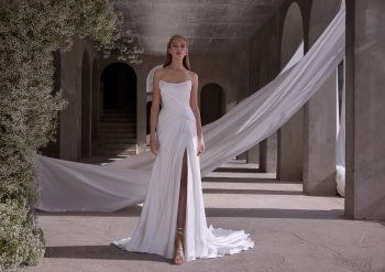 Morilee Zenobia 2941 a fit and flare, silky satin wedding dress with a scoop neckline.