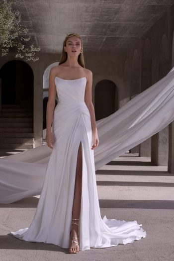 Morilee Zenobia 2941 a fit and flare, silky satin wedding dress with a scoop neckline.