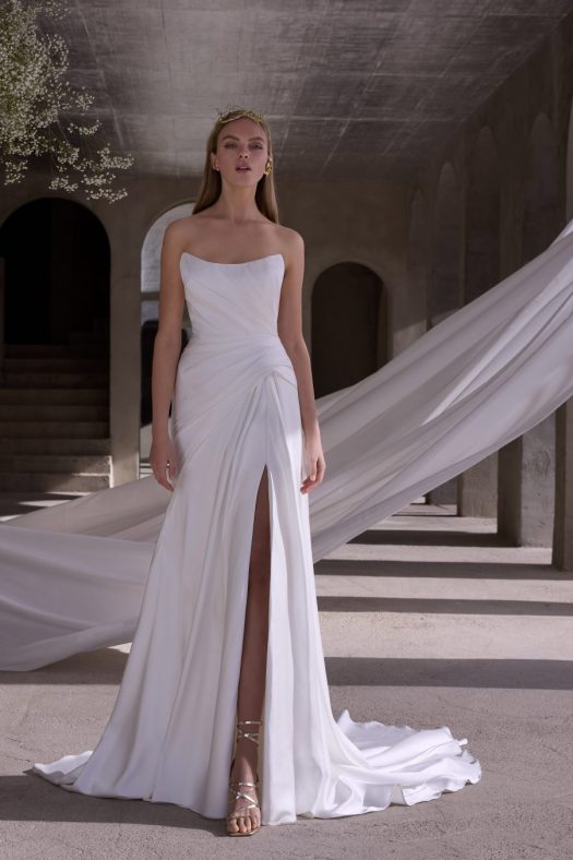 Morilee Zenobia 2941 a fit and flare, silky satin wedding dress with a scoop neckline.