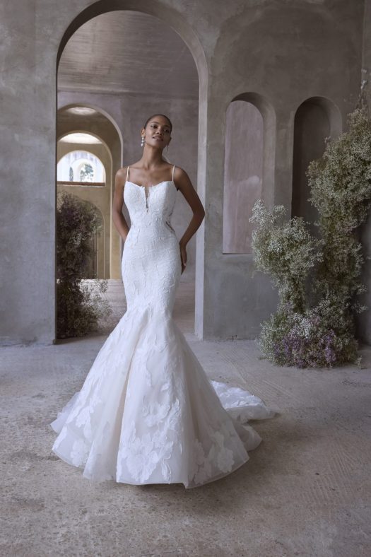 Morilee Selene 2904, mermaid wedding dress with floral appliqued tulle, scoop neckline, illusion side cut outs and an open back.