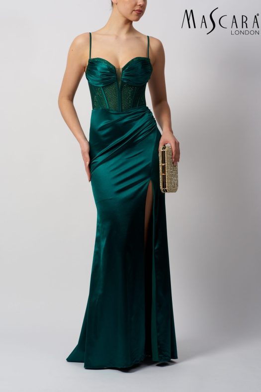 MC11434 A fitting satin prom dress with a beaded corset top and a side split in the skirt.