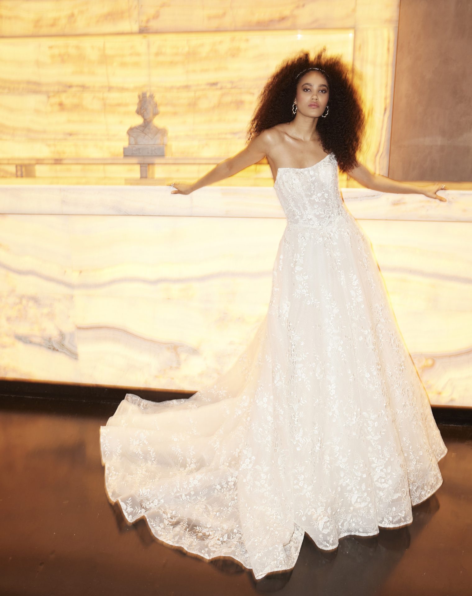 Larkin from the Miamia by Alan Hannah 2026 collection. A soft A-line wedding dress with a strapless bodice with layers of delicate floral lace.
