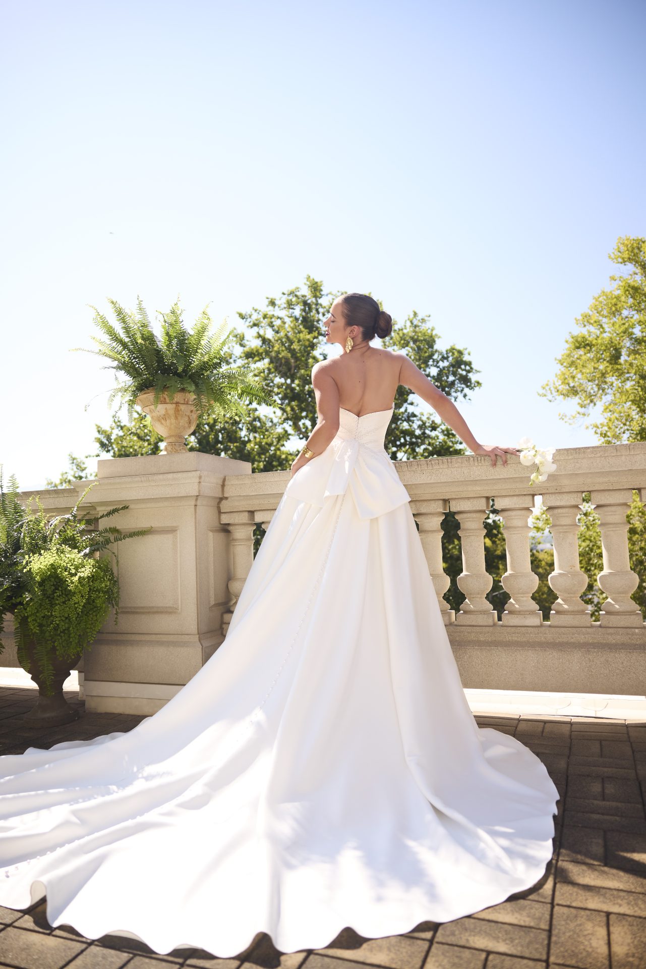 Sottero and Midgley wedding dress Kincaid. Beaded satin ballgown with pearl back buttons trailing to the hem.