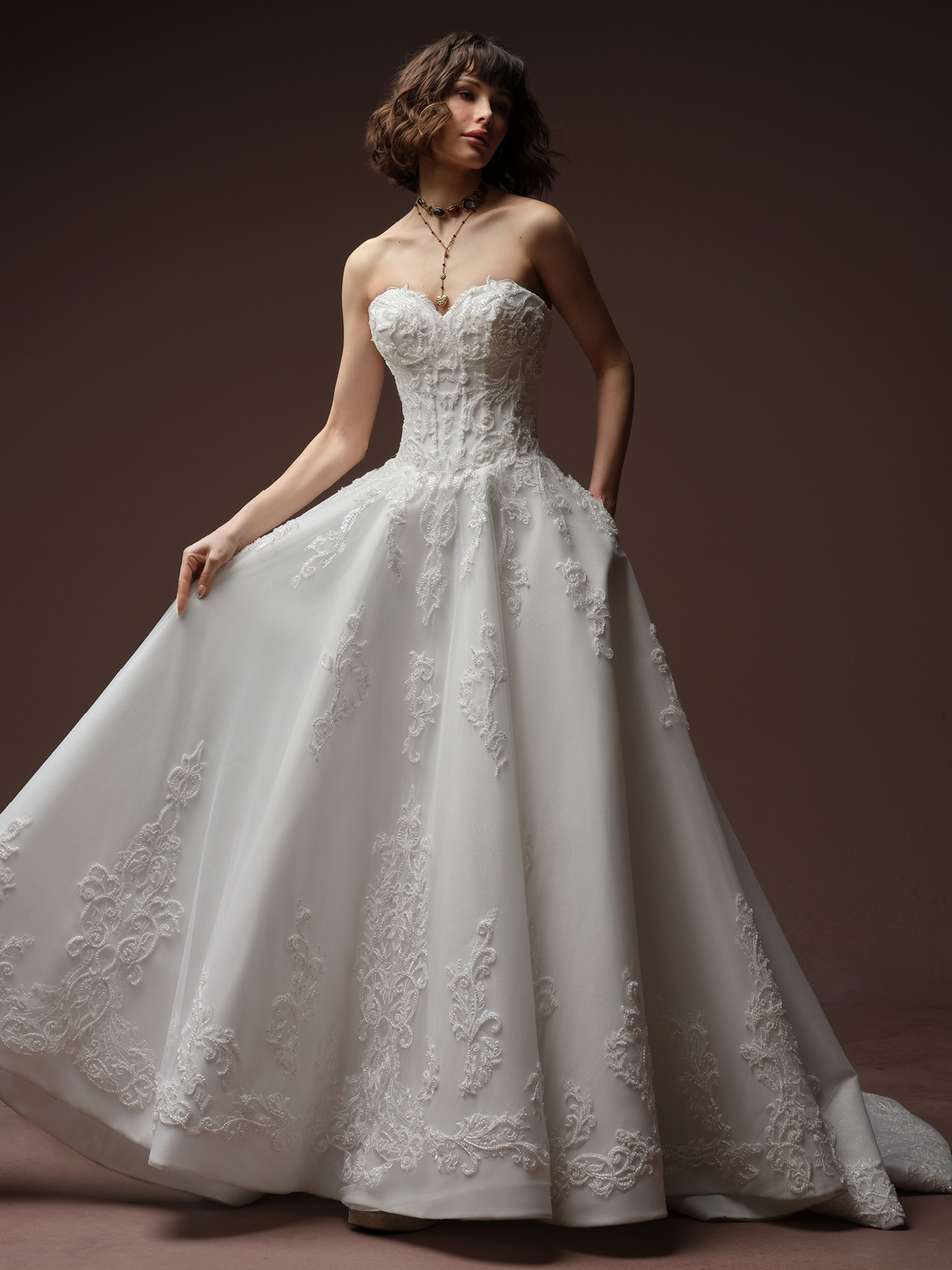 Gwyneth, Sottero and Midgley ballgown wedding dress with beaded lace motifs, soft pear and embroidered florals and glitter tulle.